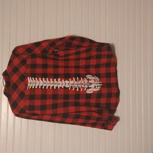 Black and red flannel with spine print on back. Double Breast pocket Hot Topic